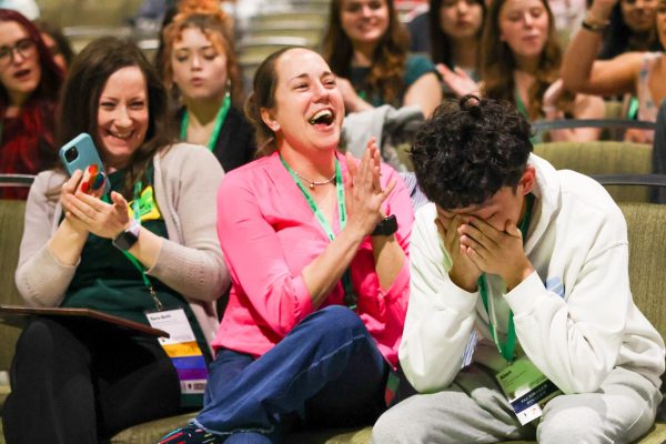Monta Vista High School senior Alan Tai reacts to being named the National High School Journalist of the Year as his El Estoque adviser and co-adviser Julia Satterthwaite, MJE, cheers him on during the JEA/NSPA  convention on April 26 in Seattle. Tai is the second student from MVHS to receive this honor.
