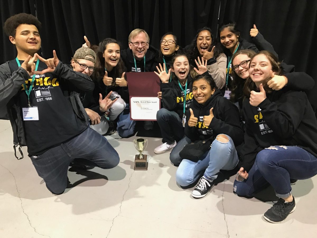 Then-journalism adviser Don Bott (center) celebrates with the Stagg Line staff after winning Best of Show at the JEA/NSPA Spring Journalism Convention in Seattle in 2017. Bott's 40 years as a teacher is the basis for his new book, "Forty years, forty stories."